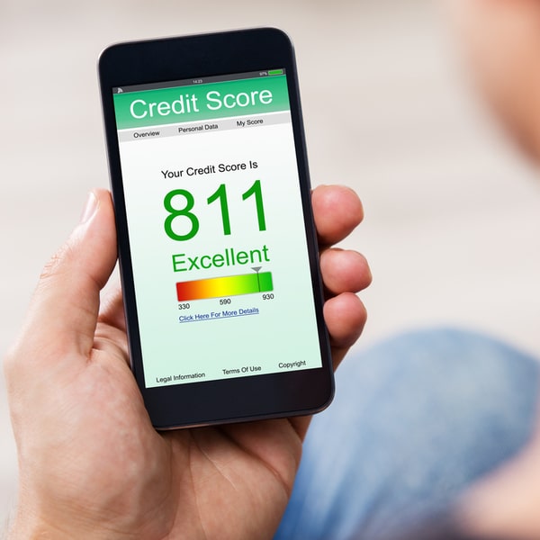 An individual checking his credit score